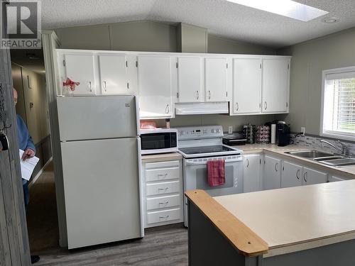 27 3889 Muller Avenue, Terrace, BC - Indoor Photo Showing Kitchen With Double Sink