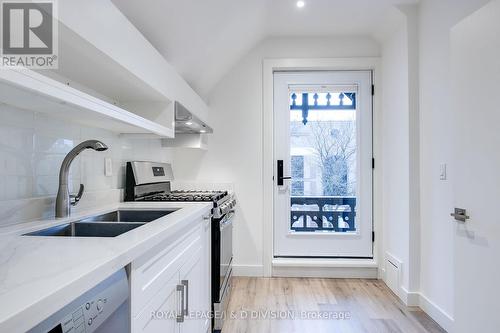 D - 43 Cecil Street, Toronto, ON - Indoor Photo Showing Kitchen With Double Sink