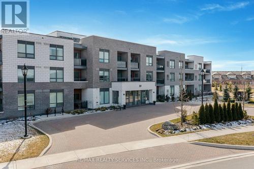 318 - 30 Via Rosedale, Brampton, ON - Outdoor With Balcony With Facade