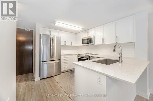 318 - 30 Via Rosedale, Brampton, ON - Indoor Photo Showing Kitchen With Stainless Steel Kitchen With Upgraded Kitchen