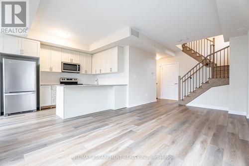 123 - 1577 Rose Way, Milton, ON - Indoor Photo Showing Kitchen