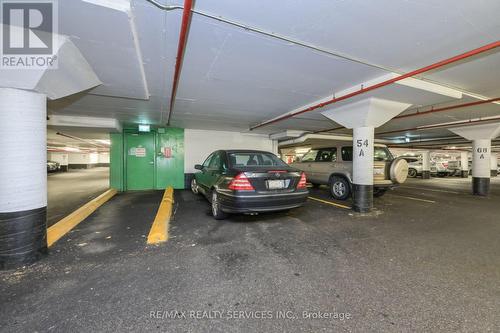 308 - 350 Webb Drive, Mississauga, ON - Indoor Photo Showing Garage