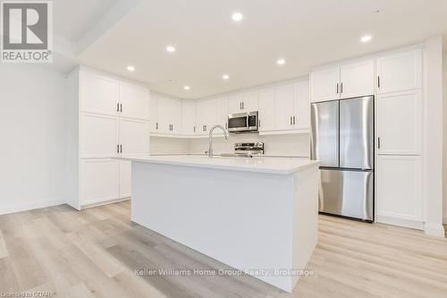 302 - 99B Farley Road, Centre Wellington (Fergus), ON - Indoor Photo Showing Kitchen With Stainless Steel Kitchen With Upgraded Kitchen