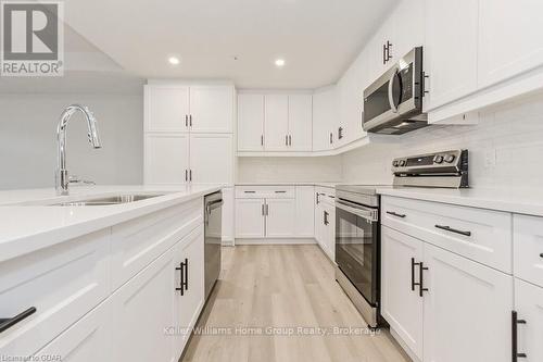 302 - 99B Farley Road, Centre Wellington (Fergus), ON - Indoor Photo Showing Kitchen