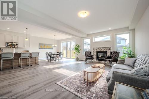 45 Queensgate Crescent, Woolwich, ON - Indoor Photo Showing Living Room With Fireplace