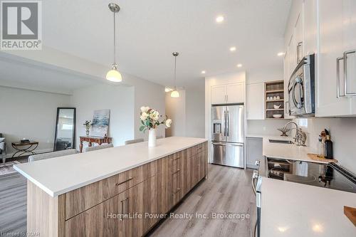 45 Queensgate Crescent, Woolwich, ON - Indoor Photo Showing Kitchen With Upgraded Kitchen