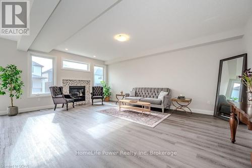 45 Queensgate Crescent, Woolwich, ON - Indoor Photo Showing Living Room With Fireplace