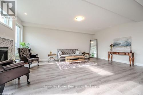 45 Queensgate Crescent, Woolwich, ON - Indoor Photo Showing Other Room With Fireplace