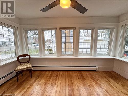 Sunroom / solarium with plenty of natural light and baseboard heating - 166 North Street, Fort Erie, ON - Indoor