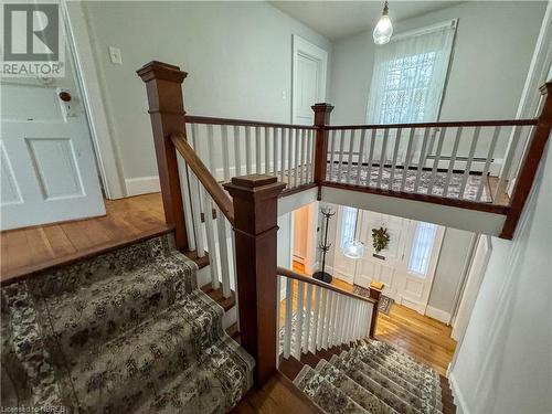 Staircase featuring hardwood / wood-style floors - 166 North Street, Fort Erie, ON - Indoor Photo Showing Other Room