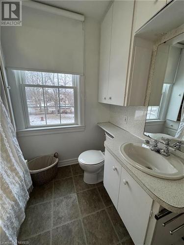 Bathroom featuring tile patterned flooring, vanity, and toilet - 166 North Street, Fort Erie, ON - Indoor Photo Showing Bathroom