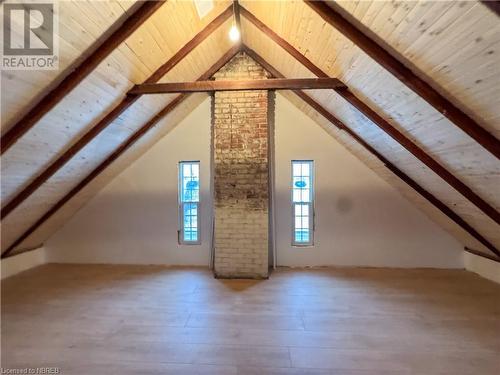 Additional living space featuring high vaulted ceiling, beamed ceiling, wooden ceiling, and hardwood / wood-style flooring - 166 North Street, Fort Erie, ON - Indoor Photo Showing Other Room