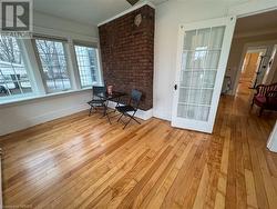 Unfurnished room featuring light hardwood / wood-style floors and ornamental molding - 