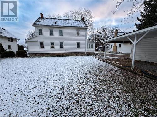 Snow covered property with a carport - 166 North Street, Fort Erie, ON - Outdoor