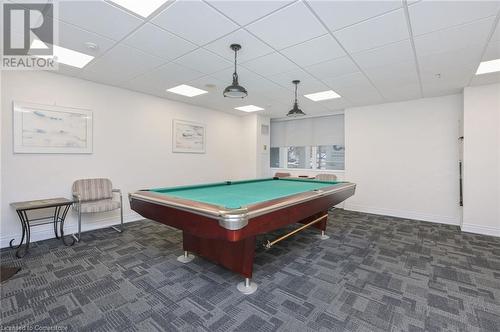 Rec room with a paneled ceiling, dark carpet, and billiards - 305 Webb Drive Unit# 308, Mississauga, ON 