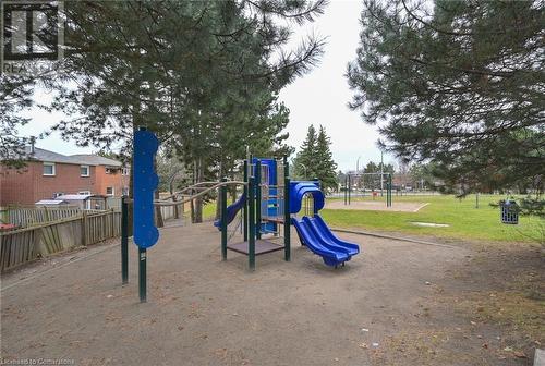 View of jungle gym with a lawn - 305 Webb Drive Unit# 308, Mississauga, ON 