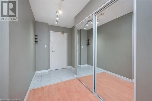 Doorway featuring light wood-type flooring - 305 Webb Drive Unit# 308, Mississauga, ON 