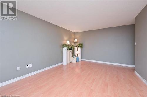 Spare room featuring light hardwood / wood-style floors - 305 Webb Drive Unit# 308, Mississauga, ON 