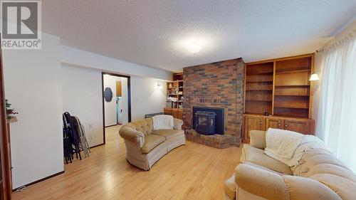 9311 114A Avenue, Fort St. John, BC - Indoor Photo Showing Living Room With Fireplace