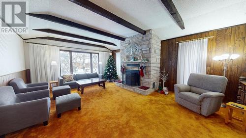 9311 114A Avenue, Fort St. John, BC - Indoor Photo Showing Living Room With Fireplace