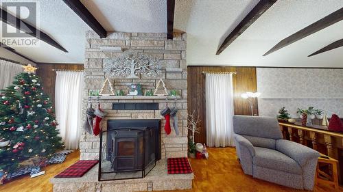 9311 114A Avenue, Fort St. John, BC - Indoor Photo Showing Living Room With Fireplace