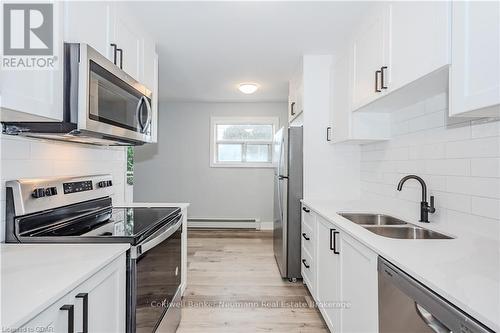 204 - 10 Glenbrook Drive, Guelph (Waverley), ON - Indoor Photo Showing Kitchen With Double Sink With Upgraded Kitchen