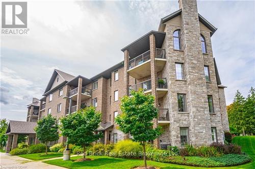 207 - 6492 Gerrie Road, Centre Wellington (Elora/Salem), ON - Outdoor With Balcony With Facade