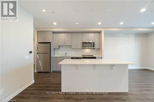 1411 - 15 Queen Street S, Hamilton (Strathcona), ON - Indoor Photo Showing Kitchen With Stainless Steel Kitchen With Upgraded Kitchen