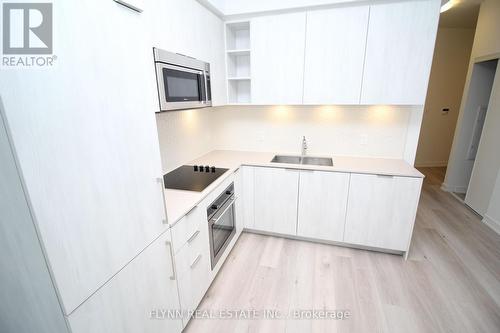 323 - 50 Ordnance Street, Toronto, ON - Indoor Photo Showing Kitchen