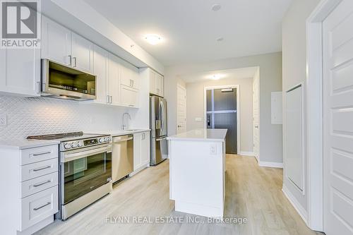 401 - 490 Gordon Krantz Avenue, Milton, ON - Indoor Photo Showing Kitchen With Stainless Steel Kitchen With Upgraded Kitchen