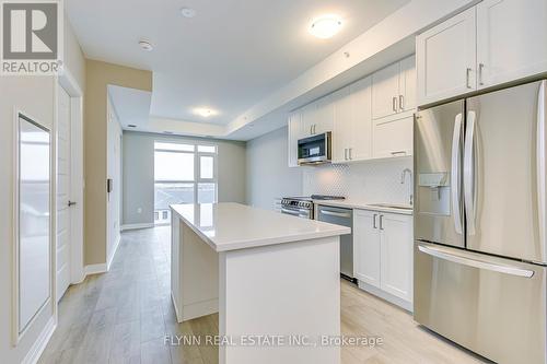 401 - 490 Gordon Krantz Avenue, Milton, ON - Indoor Photo Showing Kitchen With Upgraded Kitchen