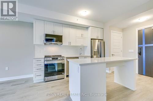 401 - 490 Gordon Krantz Avenue, Milton, ON - Indoor Photo Showing Kitchen With Stainless Steel Kitchen With Upgraded Kitchen