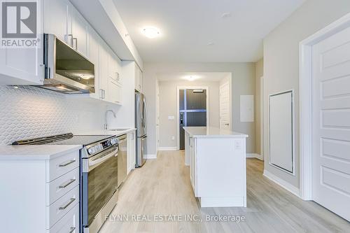 401 - 490 Gordon Krantz Avenue, Milton, ON - Indoor Photo Showing Kitchen With Upgraded Kitchen