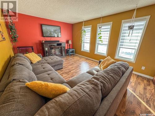 811 Soames Street, Indian Head, SK - Indoor Photo Showing Living Room With Fireplace