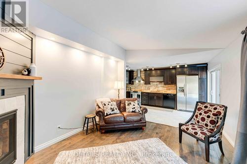 109 Beechfern Drive, Ottawa, ON - Indoor Photo Showing Living Room With Fireplace