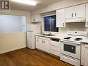 765-769 Ahbau Street, Prince George, BC  - Indoor Photo Showing Kitchen With Double Sink 