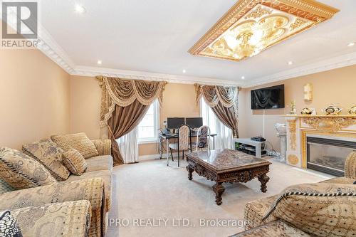 2 Hugo Road, Brampton, ON - Indoor Photo Showing Living Room With Fireplace