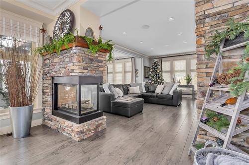 1169 Bellagio Avenue, Kelowna, BC - Indoor Photo Showing Living Room With Fireplace