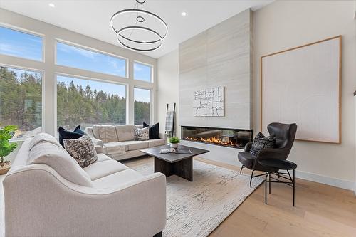 3462 Hilltown Close, Kelowna, BC - Indoor Photo Showing Living Room With Fireplace