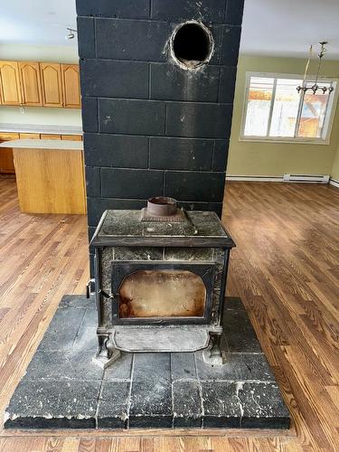 5385 Highway 33, Beaverdell, BC - Indoor Photo Showing Other Room With Fireplace