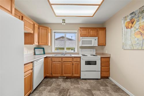 2-2675 Pine Avenue, Lumby, BC - Indoor Photo Showing Kitchen With Double Sink