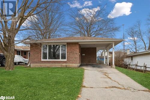 View of front facade with a front lawn and a carport - 41 Kovac Road, Cambridge, ON - Outdoor