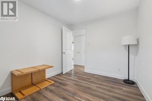 Empty room featuring dark hardwood / wood-style floors - 41 Kovac Road, Cambridge, ON - Indoor Photo Showing Other Room