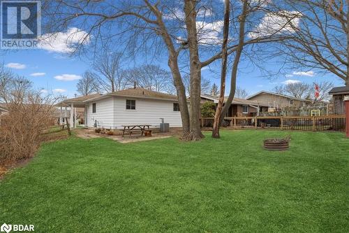 Back of property featuring a yard, a patio, and central AC unit - 41 Kovac Road, Cambridge, ON - Outdoor