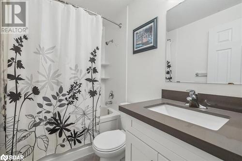 Full bathroom with vanity, toilet, and shower / bath combo with shower curtain - 41 Kovac Road, Cambridge, ON - Indoor Photo Showing Bathroom