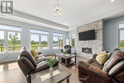 132 Cherrywood Parkway, Greater Napanee, ON - Indoor Photo Showing Living Room With Fireplace