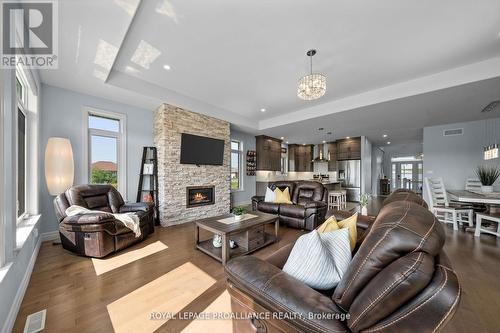 132 Cherrywood Parkway, Greater Napanee, ON - Indoor Photo Showing Living Room With Fireplace