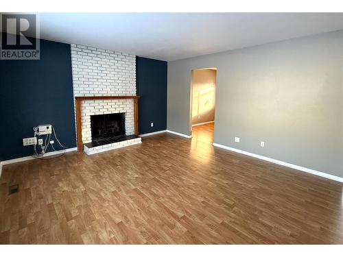 823 6Th Avenue, Kimberley, BC - Indoor Photo Showing Living Room With Fireplace