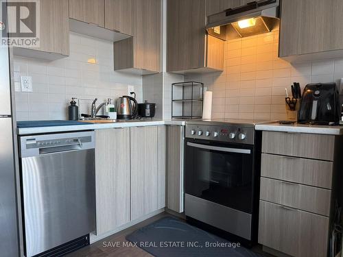 211 - 20 Orchid Court, Toronto, ON - Indoor Photo Showing Kitchen