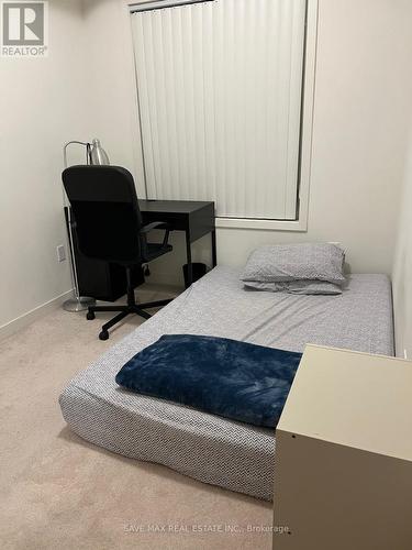 211 - 20 Orchid Court, Toronto, ON - Indoor Photo Showing Bedroom